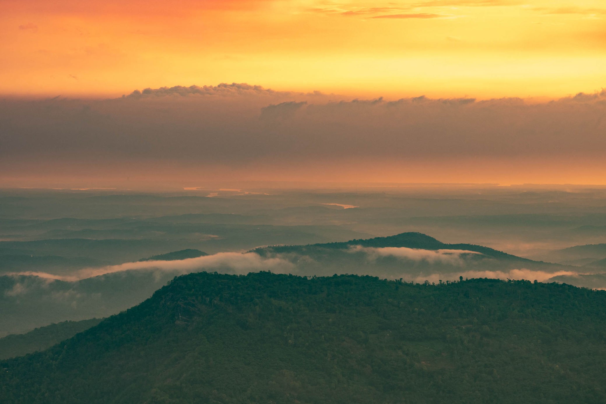 Misty sunrise over the Western Ghats mountain range